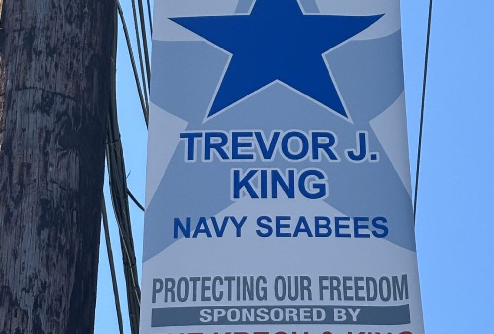 King, Trevor J.